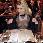 Skinny blonde flashing boobs trough transparent blouse in restaurant