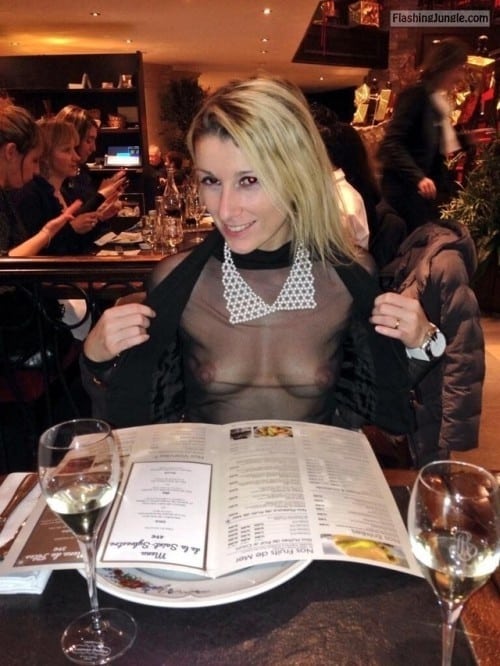 Boobs Flash Pics: Skinny blonde flashing boobs trough transparent blouse in restaurant
