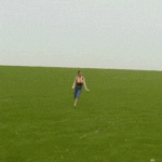 Redhead Big boobs out running in grass