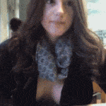 Brunette is getting careful in library