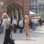 Leipzig Germany: Naked blonde walking down pedestrian zone