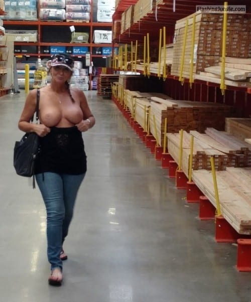 Boobs Flash Pics: Wifey with baseball cap flashing big round tits in store