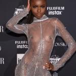 Leomi Anderson no bra see through blouse black tits