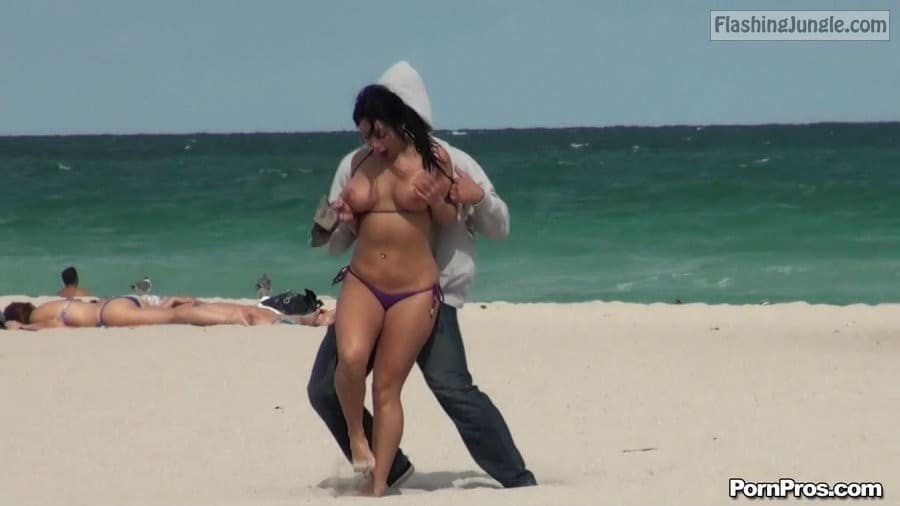 Boobs Flash Pics: Exotic busty girl in purple bikini big tits sharking