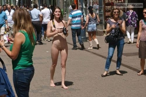 Public Nudity Pics  : Cute brunette nude photographer in crowded street
