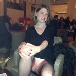 Pantyless smiling Milf red nails, red lipstick, red garters