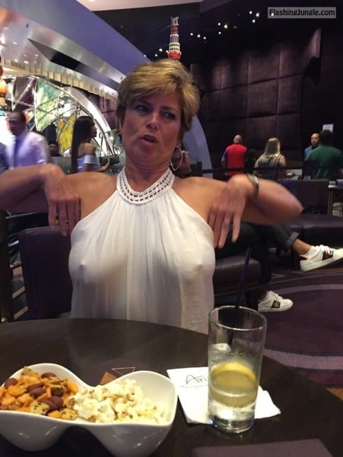 Bitch Flashing Pics: Mature wife: Pokies at the restaurant means hit on some hansom guy