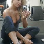 Tattooed blonde one tit out selfie from gym