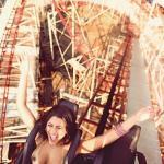 Topless on roller coaster: big boobs and tan lines