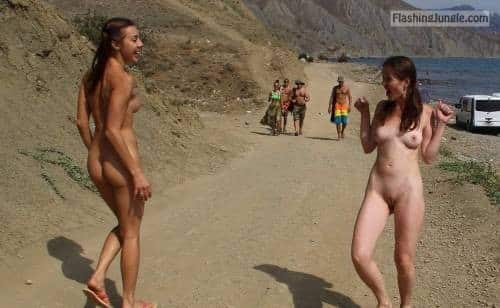 Two naked friends met each other nude beach