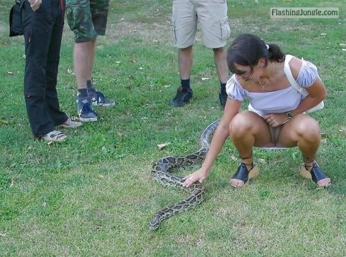 Public Flashing Pics  : carelessinpublic:Catching a python in a park in a short dress…