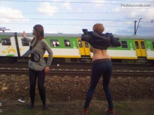 Bitch Flashing Pics: Two sluts flashing train