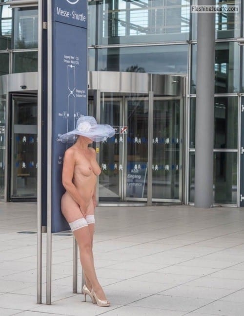 Public Nudity Pics  : Nude in white hat stockings and high heels