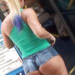 Underbutt in tight denim shorts. Blonde in public bus