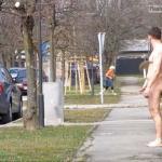 Naked guy masturbating on sidewalk
