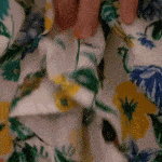 Pulling up her dress