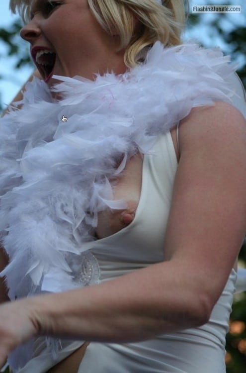 Voyeur Pics Public Flashing Pics Pokies Pics Hotwife Pics Boobs Flash Pics  : UK bride accidental nip slip caught on camera