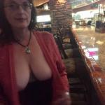 Mature lady flashing really beautiful natural tits at restaurant