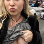 Kiss and tits flash at shopping store. Cute blonde with saggy tits