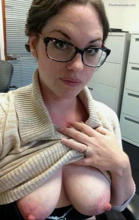 Boobs Flash Pics  : Secretary with nerdy glasses flashing Suckable nipples at work