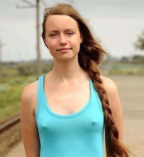 Pokies  under turquoise tank top in public