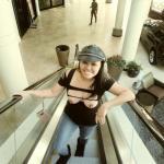 Mexican college girl boobs out on escalator