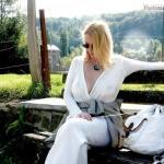 Bra less lady with big tits under see through blouse