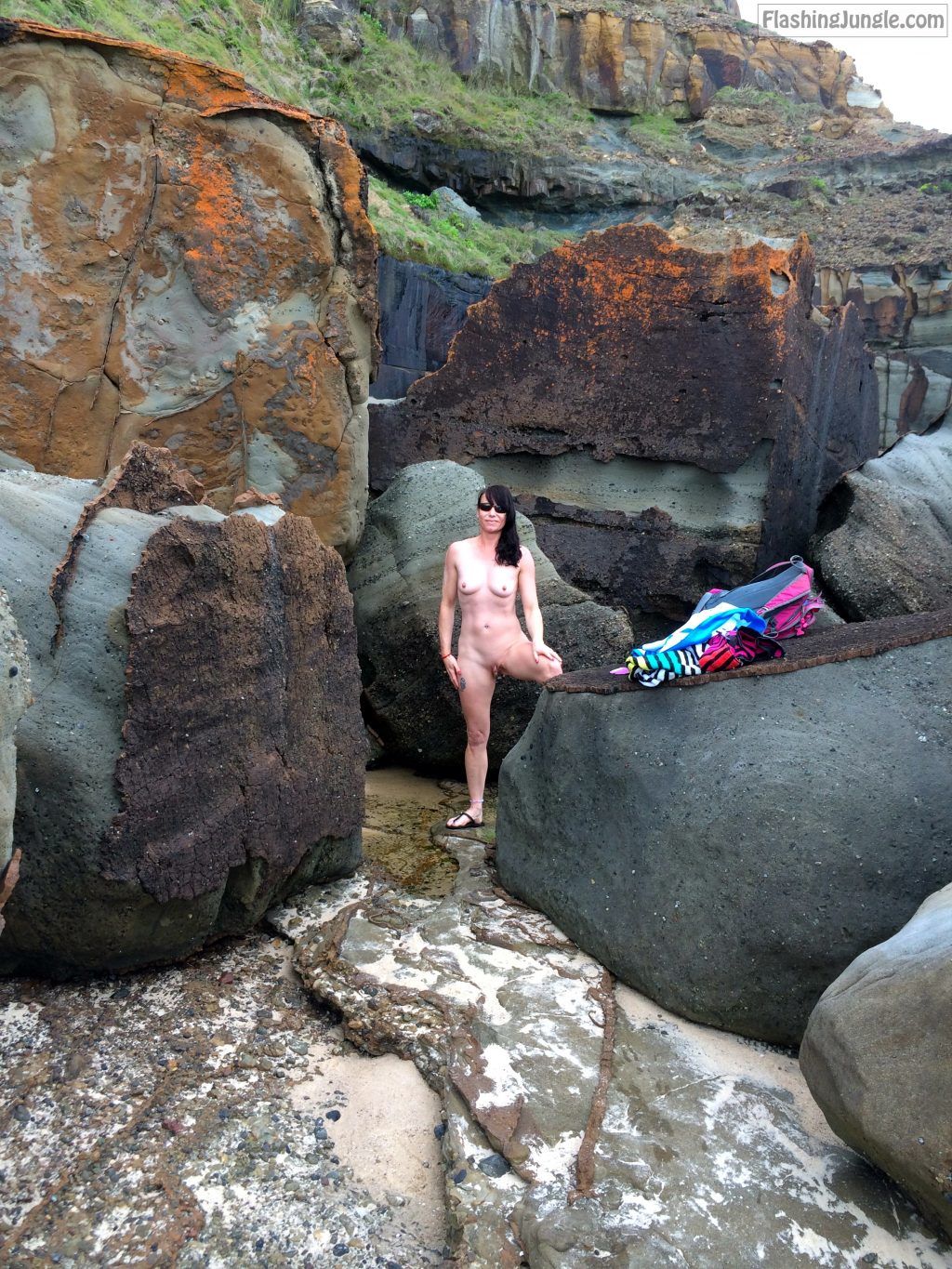 wife strip - Dark haired milf nude beach and sunglasses hot sexy wife stripped down and showing of her sexy shaved pussy and cute little tits for voyeurs on nude beach - Hotwife Pics