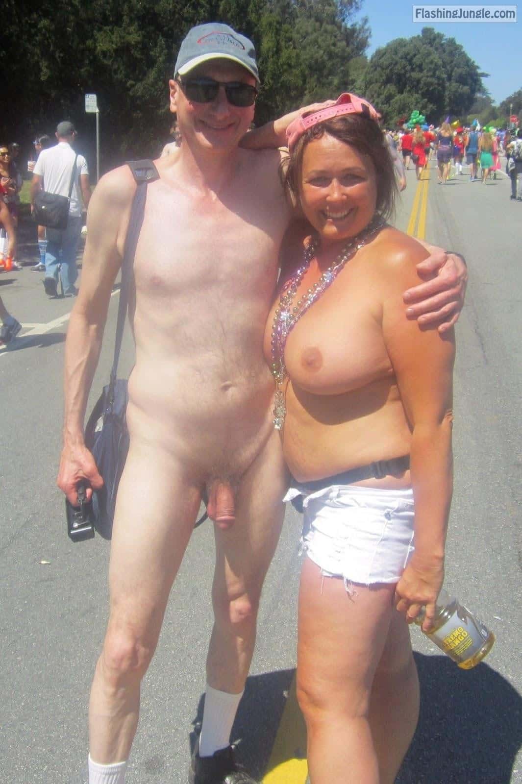 Public Nudity Pics: Topless Girl Public Nudity Exhibitionist Brucie Bay to Breakers Flashers Naked man flasher exhibitionist Brucie caught exposing his penis nude in public with sexy topless girl, MILF, flashing her big boobs, naked couple at San Francisco Bay to Breakers, nudists,...