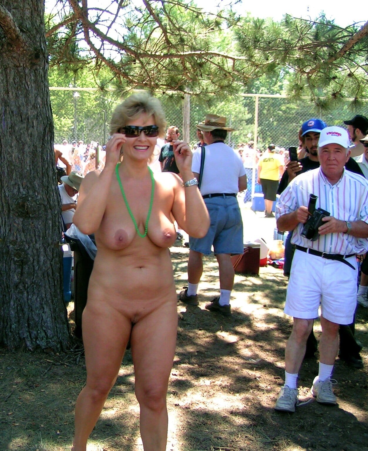 Real Amateurs Public Nudity Pics Mature Flashing Pics  : Sexy mature woman naked in a crowd