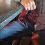 Crotchless pants in a bar