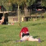 Laying knickerless in a public park – easy access for horny strangers