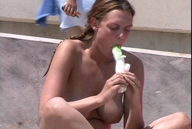 Voyeur Pics Nude Beach Pics Boobs Flash Pics  : Source: Exhibitionists Busty topless girl sucking icecream on the beach