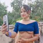 Hot desi gets photographed with half bared boobs