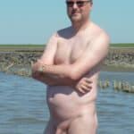 Nude daddy on the beach