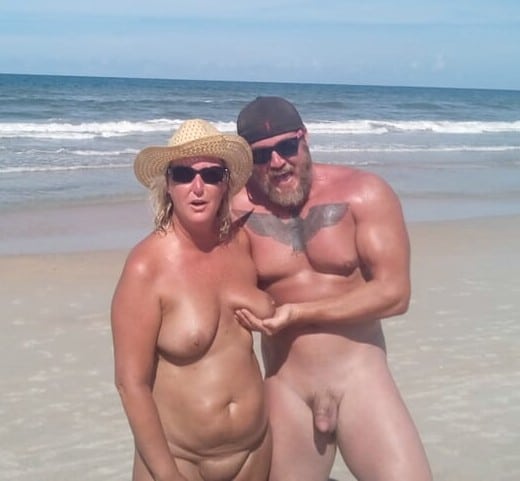 nude beach couple - Nude couple on the beach Nude beach couple posing for a picture… - Boobs Flash Pics