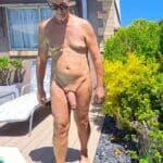 Nude walk by the pool with a cock out