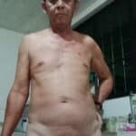 Stripping naked cock in the kitchen