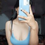 Caught in the Act: Asian Beauty Flashes Her Boobs on Camera