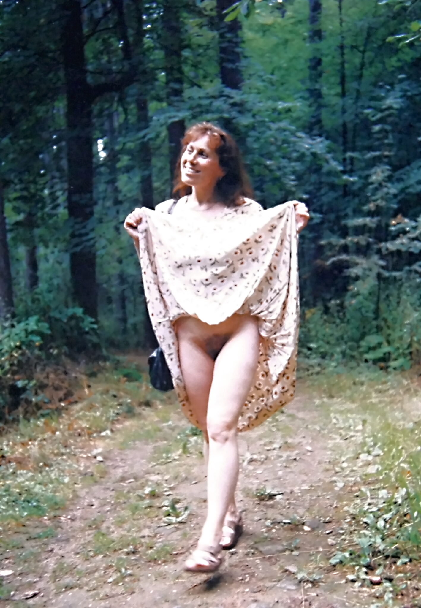 kenya forest sex photo - Can She Flash Her Boobs in the Forest Without Being Caught? A woman stands in a forest, arms outstretched, flashing her boobs in a sleeveless dress. The natural setting enhances her bold, uninhibited performance,... - Real Amateurs