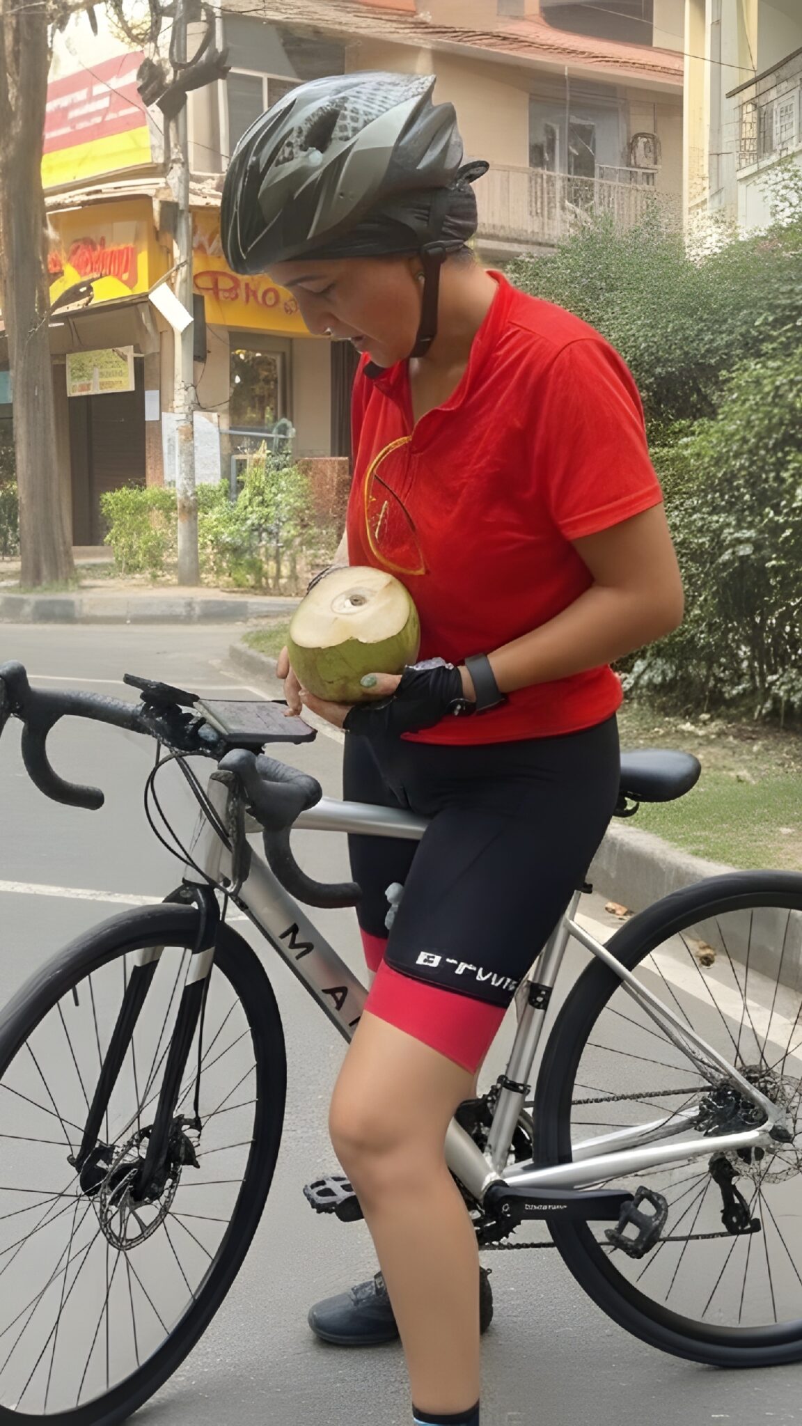 xxnxx photos juba city - Midday Urban Flash: Cyclist’s Quick Reveal A cyclist in urban gear pauses mid-ride, leaning against her bicycle, hinting at a quick reveal in a bustling city setting. - Real Amateurs