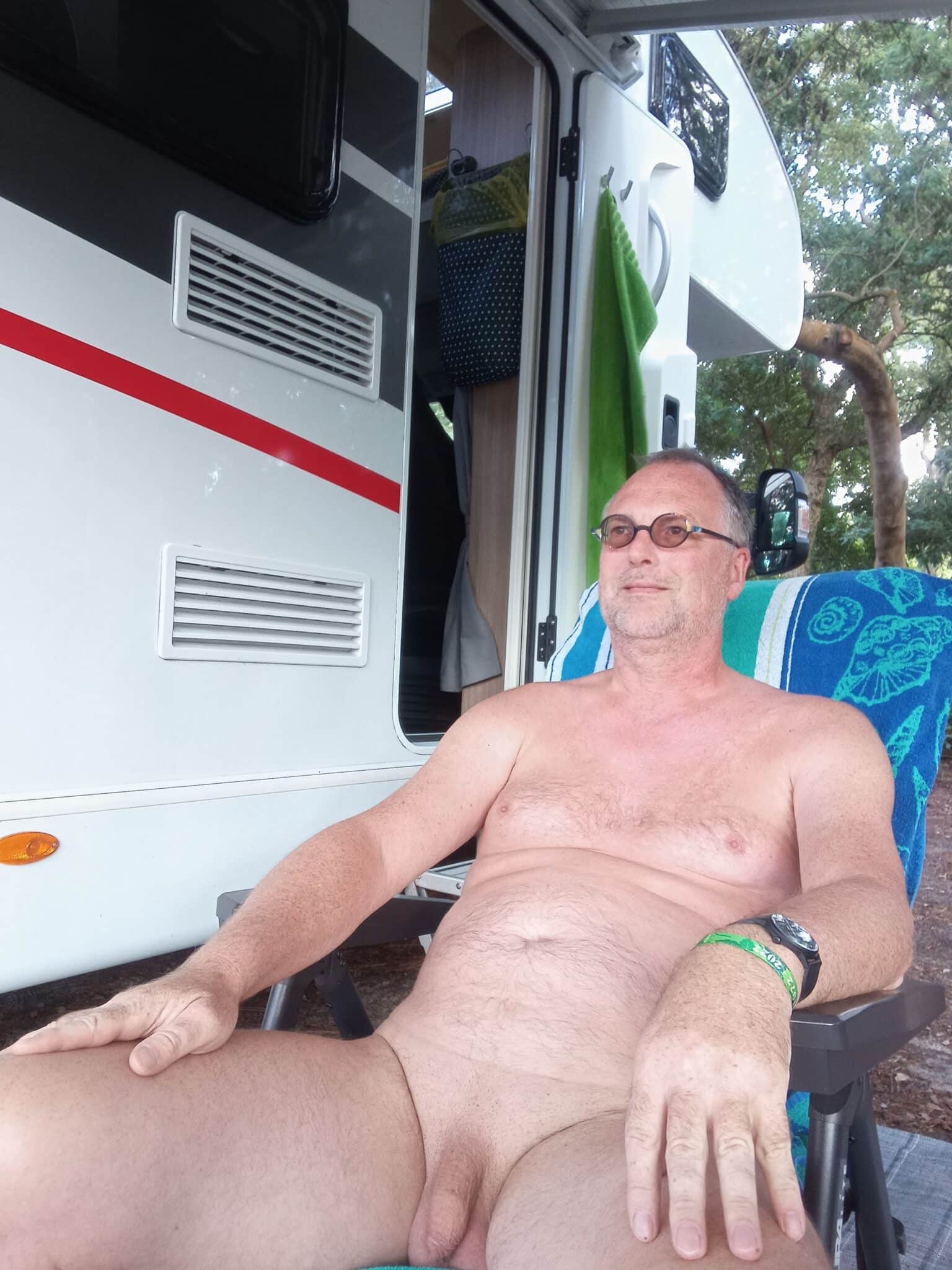 ral houewives nude - Outdoor Exposure: Mature Man Flashes by RV Mature man sits nude by RV, legs spread, genitals exposed. Casual public nudity in outdoor setting, watch and wristband visible. Neutral expression, slight s... - Dick Flash Pics