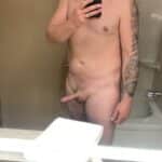 Bathroom Mirror Selfie: Bearded Man Flashes His Uncut Cock