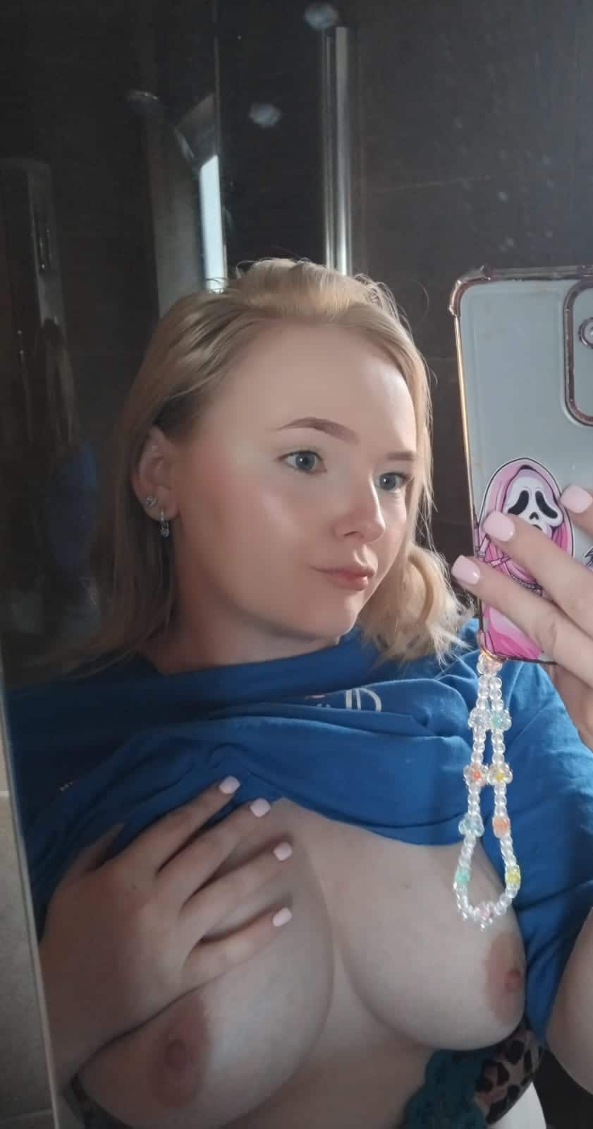 curvy nude - Blonde Bombshell Flashes Her Massive Melons A curvy blonde woman flashes her large breasts in a bathroom mirror selfie, wearing a blue t-shirt pulled up and leopard-print lingerie. Her confident pose a... - Boobs Flash Pics