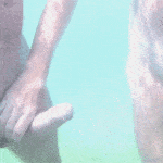 Beach Handjob: Underwater Pleasure