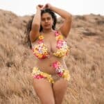 Curvy MILF Flashes Her Assets in a Sheer Bikini