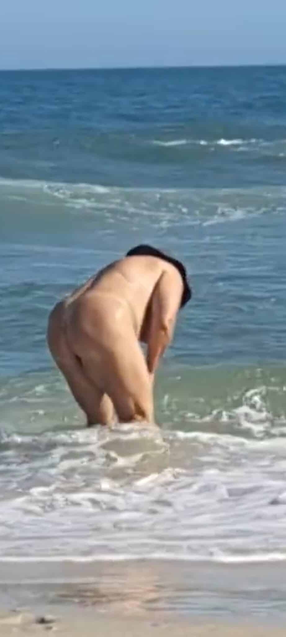 office hot milf non nude - Why Is This Mature Woman Flashing Her Ass on the Beach? A mature woman stands nude on a beach, her ass and shaved pussy visible in a rear view. She's fully exposed, legs apart, hands near the water. The setting... - Ass Flash Pics