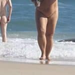 MILF Flashes Her Assets at Nude Beach