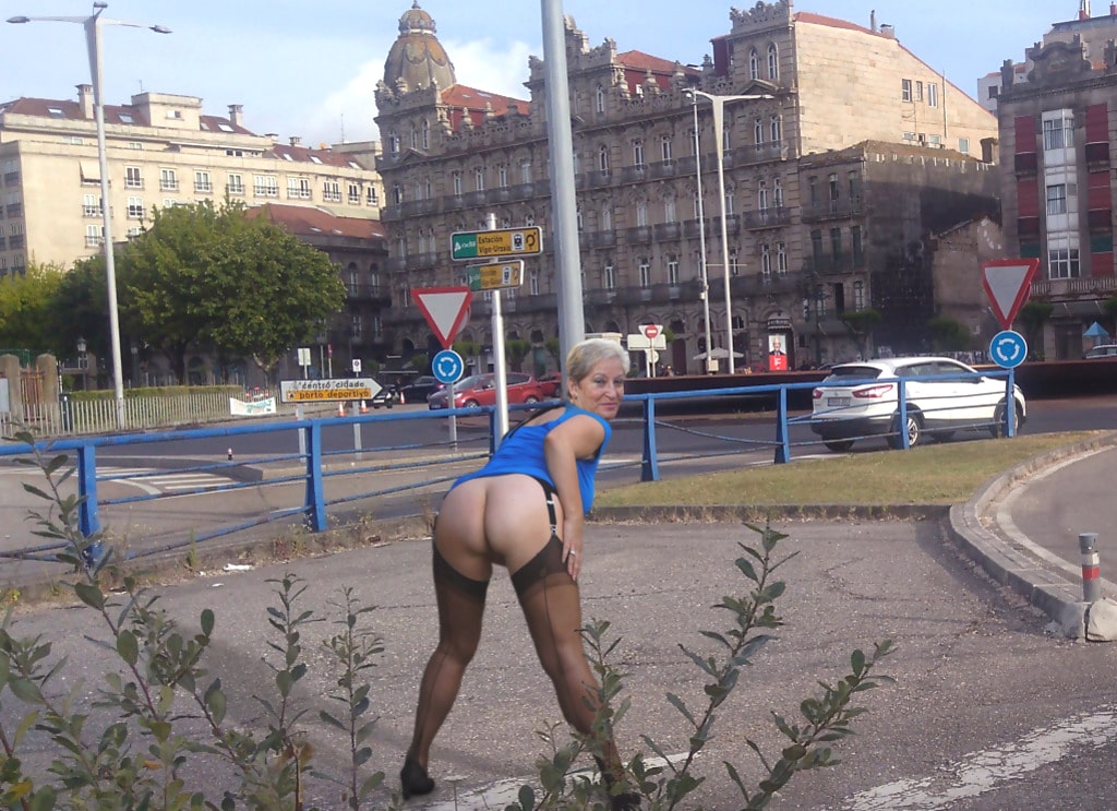 busty milf - Mature MILF Flashes Her Shaved Pussy on Urban Street Corner Mature MILF flashes her shaved pussy on an urban street corner, wearing a blue top and black thong pulled down to mid-thigh, displaying her curves and confid... - Ass Flash Pics