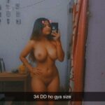 Curvy MILF Flashes Her Massive DD Boobs in Bedroom Mirror Selfie